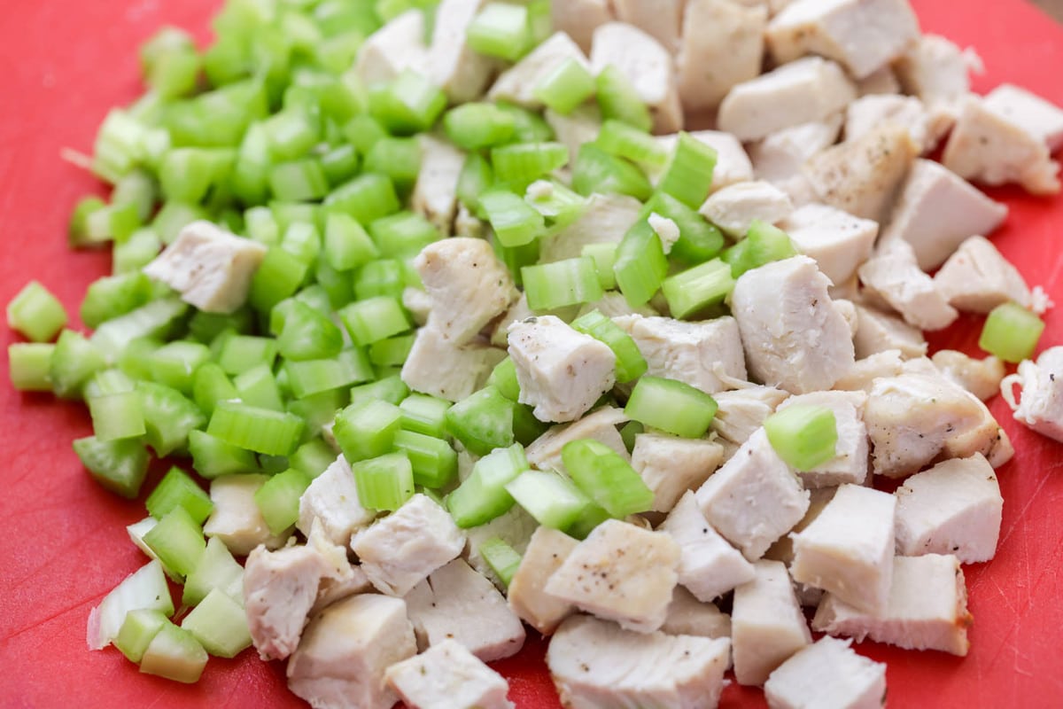 Chopped celery and chicken for chicken salad sandwich.