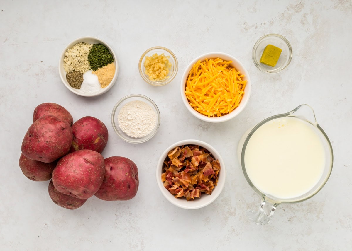 Ingredients for crock pot baked potato soup recipe on counter.