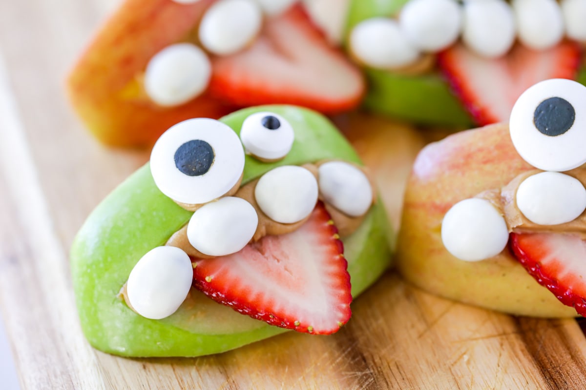 Completed apple monster teeth with candy eyes.