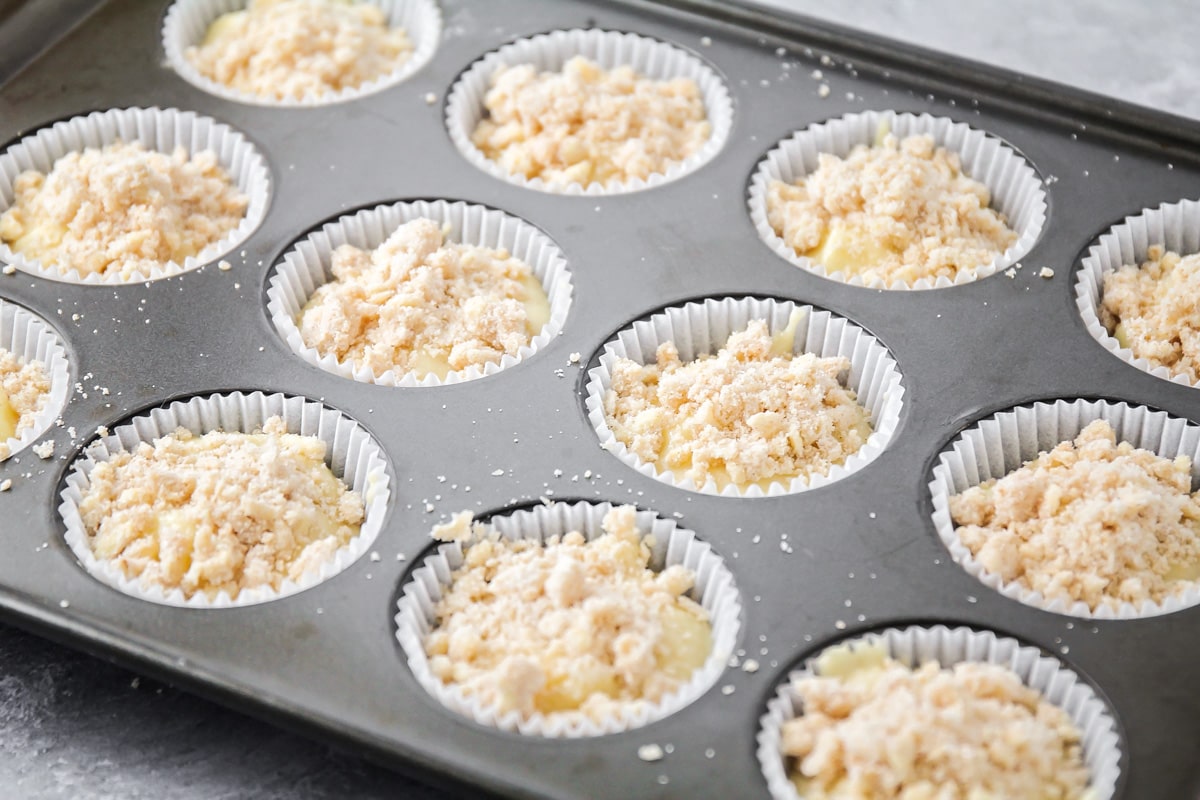 Apple muffin recipe topped with crumble ready to bake