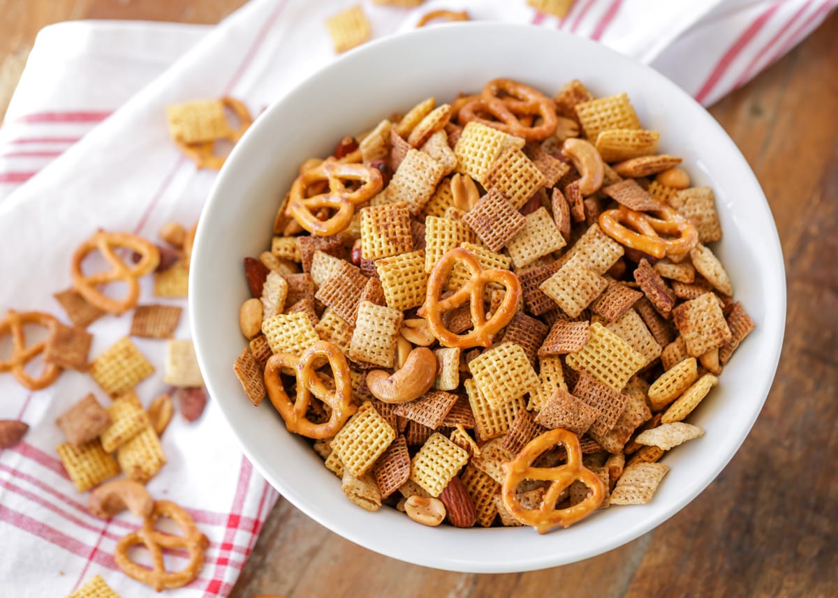 White bowl filled with Chex Mix.