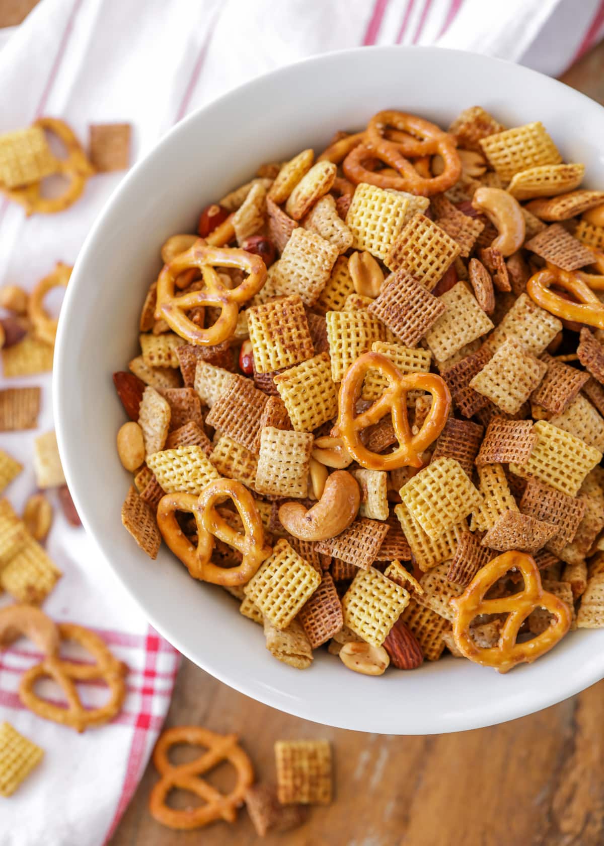 Toasted original chex mix recipe served in a white bowl.