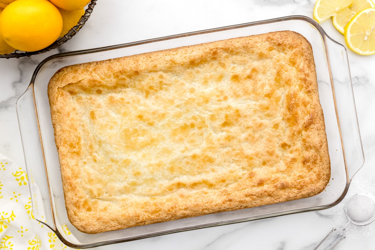 baked lemon bars with cake mix in a glass baking dish