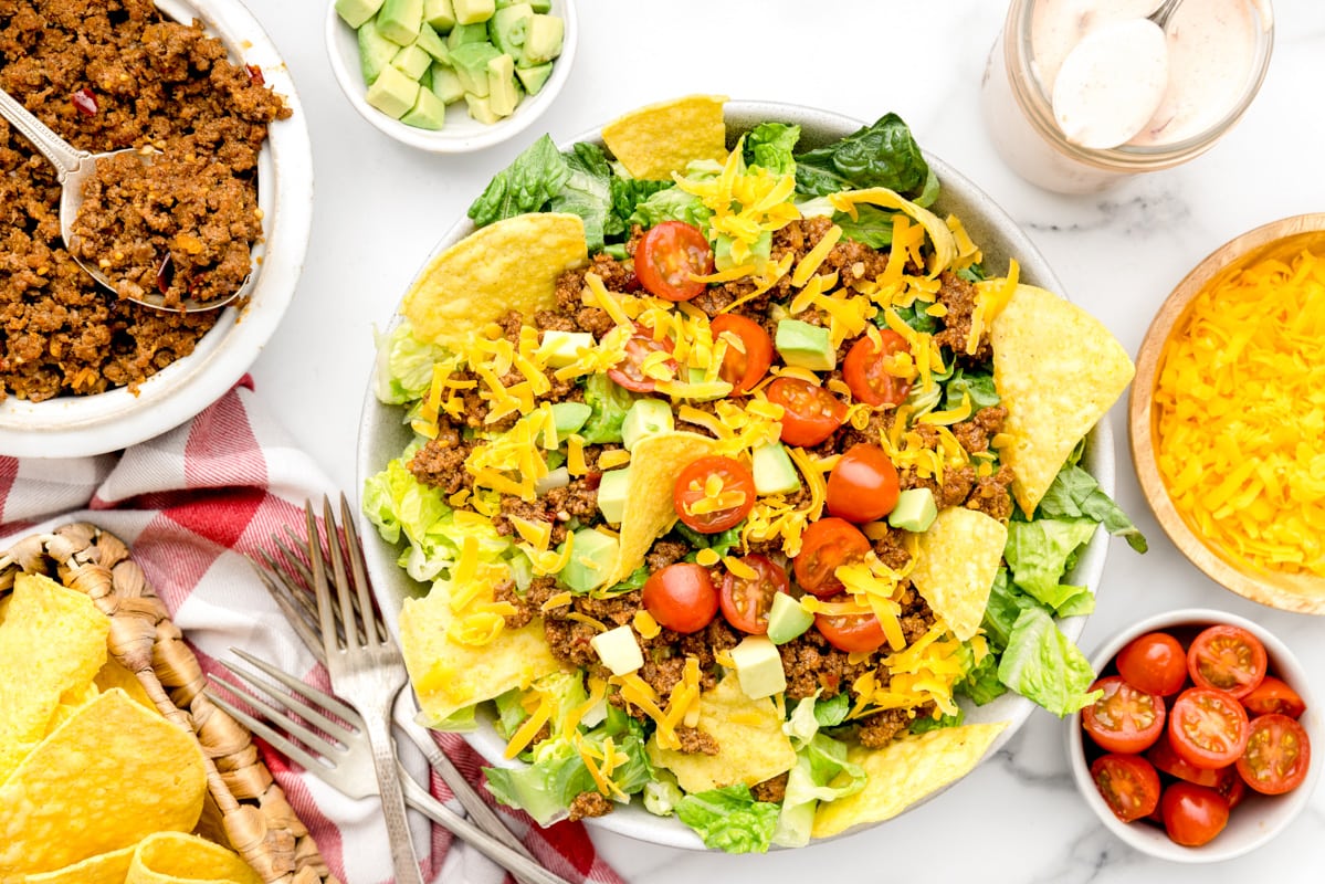 White bowl filled with taco salad.