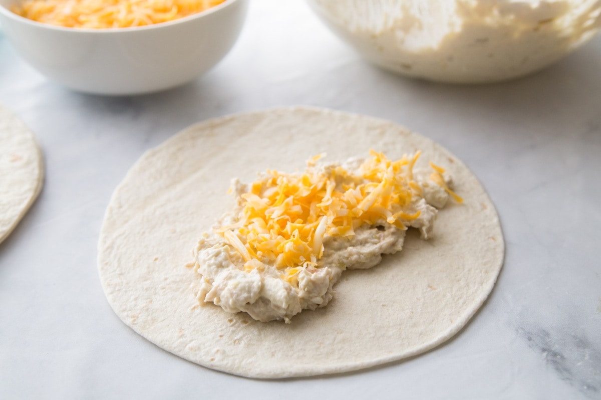 Creamy chicken enchiladas process picture.