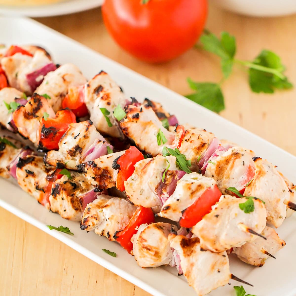 Chicken souvlaki close up image on skewers.