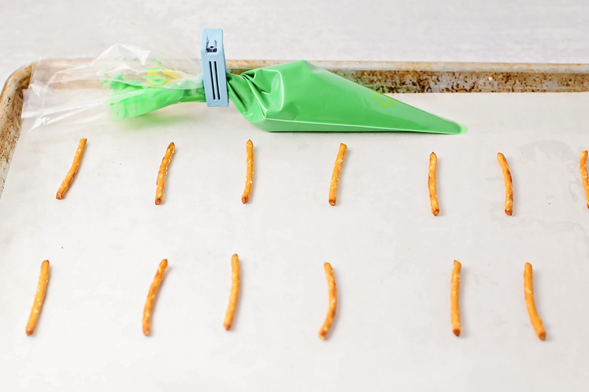 Process for making candy melt trees for Christmas cupcakes.