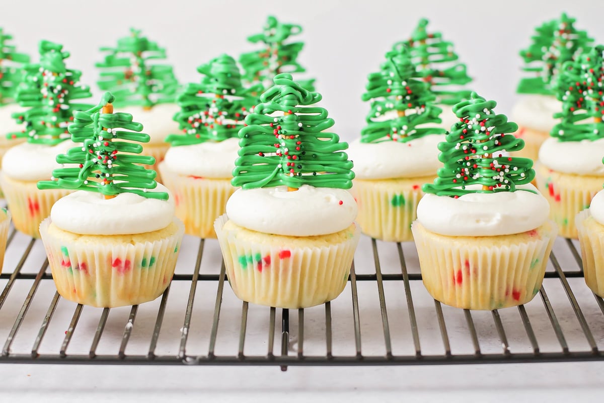 Close up of freshly assembled Christmas cupcakes.