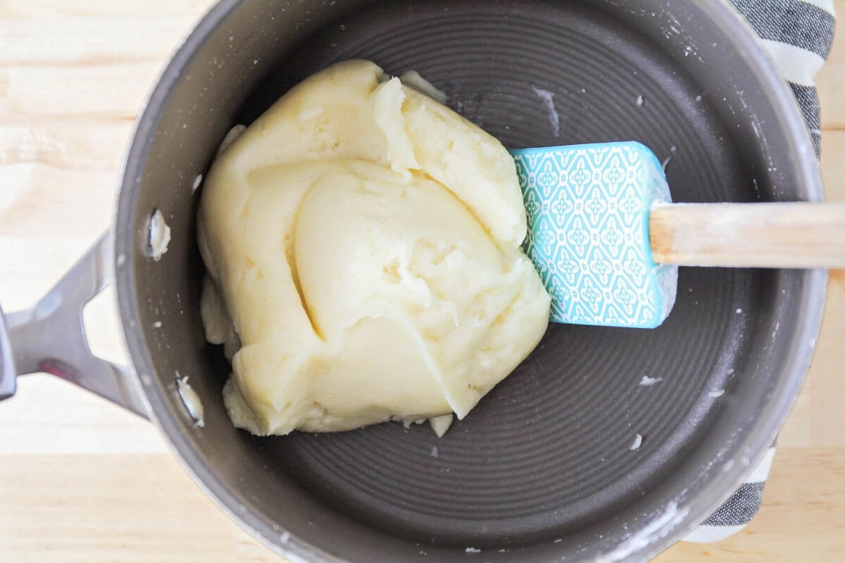 Better than the bakery's, this homemade cream puff recipe proves just how simple and easy it is to create elegant, irresistible pastries! Pastry dough in a pan.
