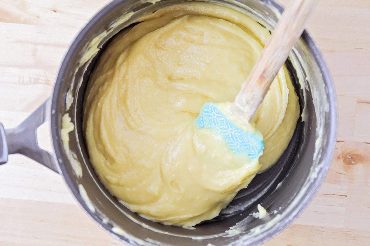 Better than the bakery's, this homemade cream puff recipe proves just how simple and easy it is to create elegant, irresistible pastries! Pastry dough in a pan.