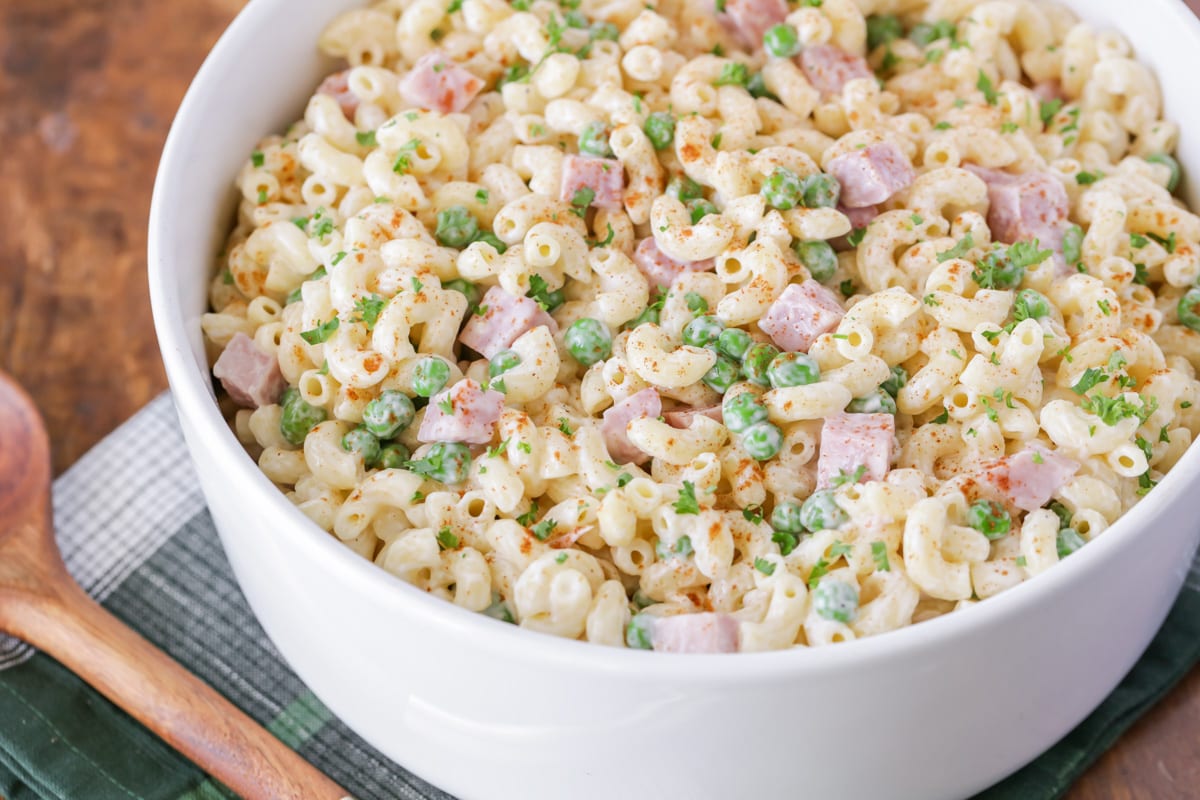 White bowl filled with macaroni salad.