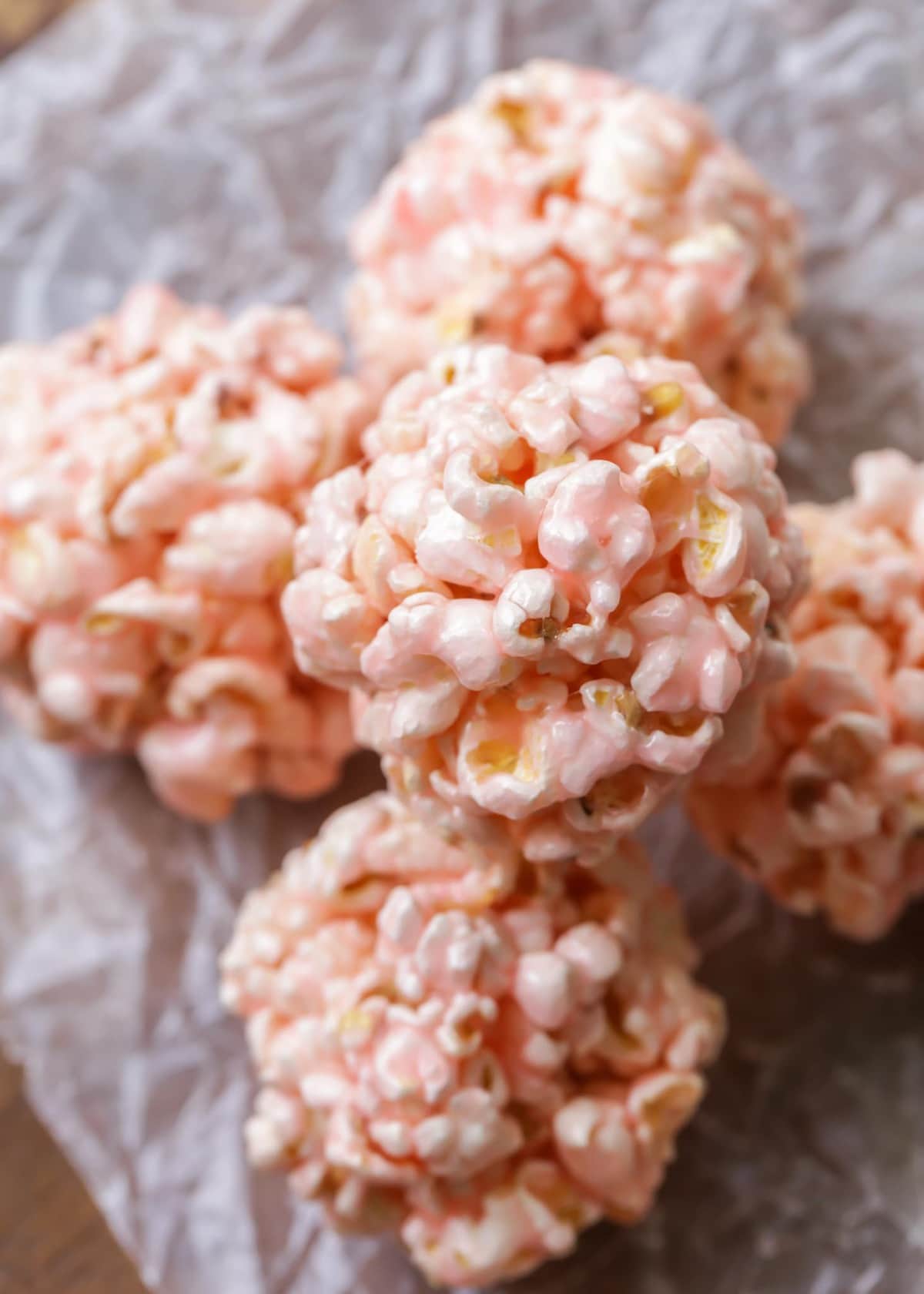 Easy popcorn balls stacked on top of each other.