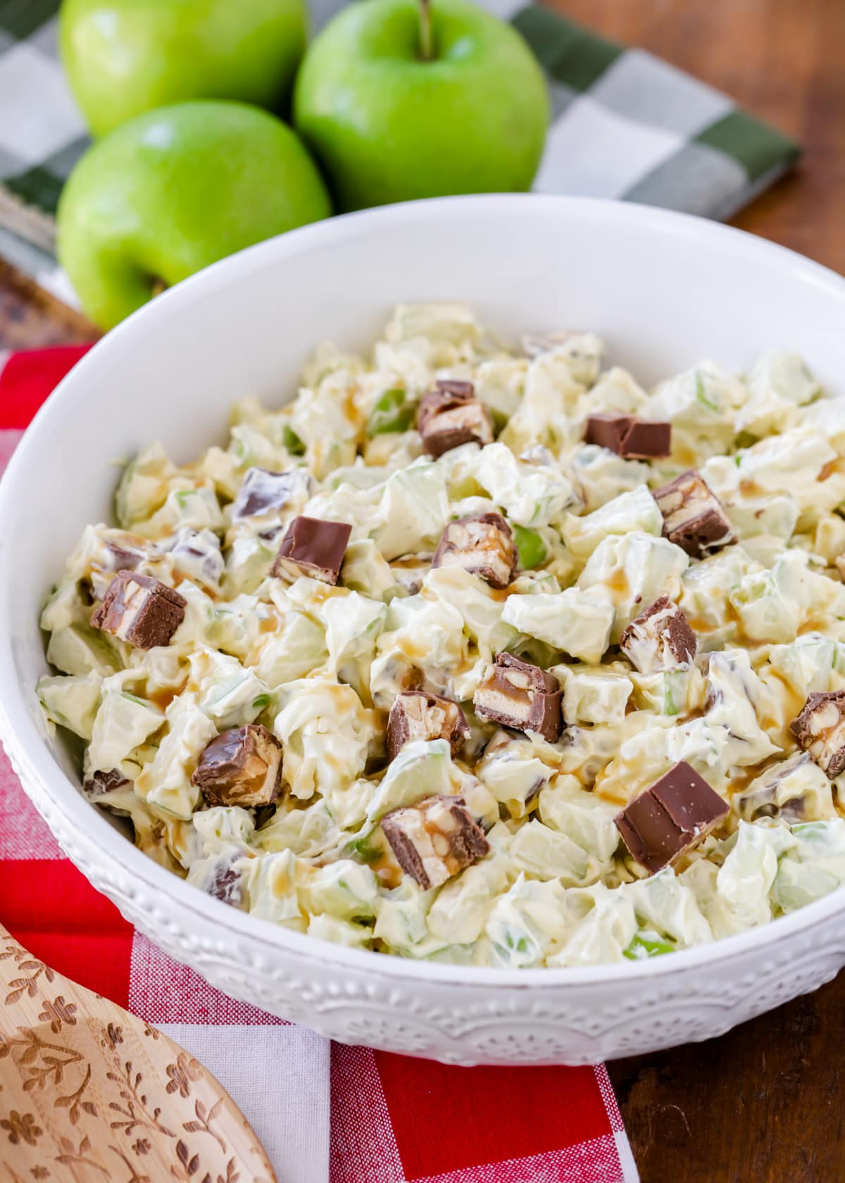Bowl filled with snicker apple salad.