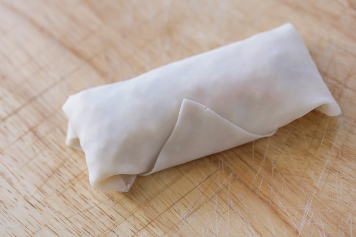 Egg roll filled and ready to be fried.