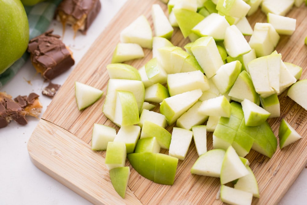 Chopping apples for snicker apple salad.