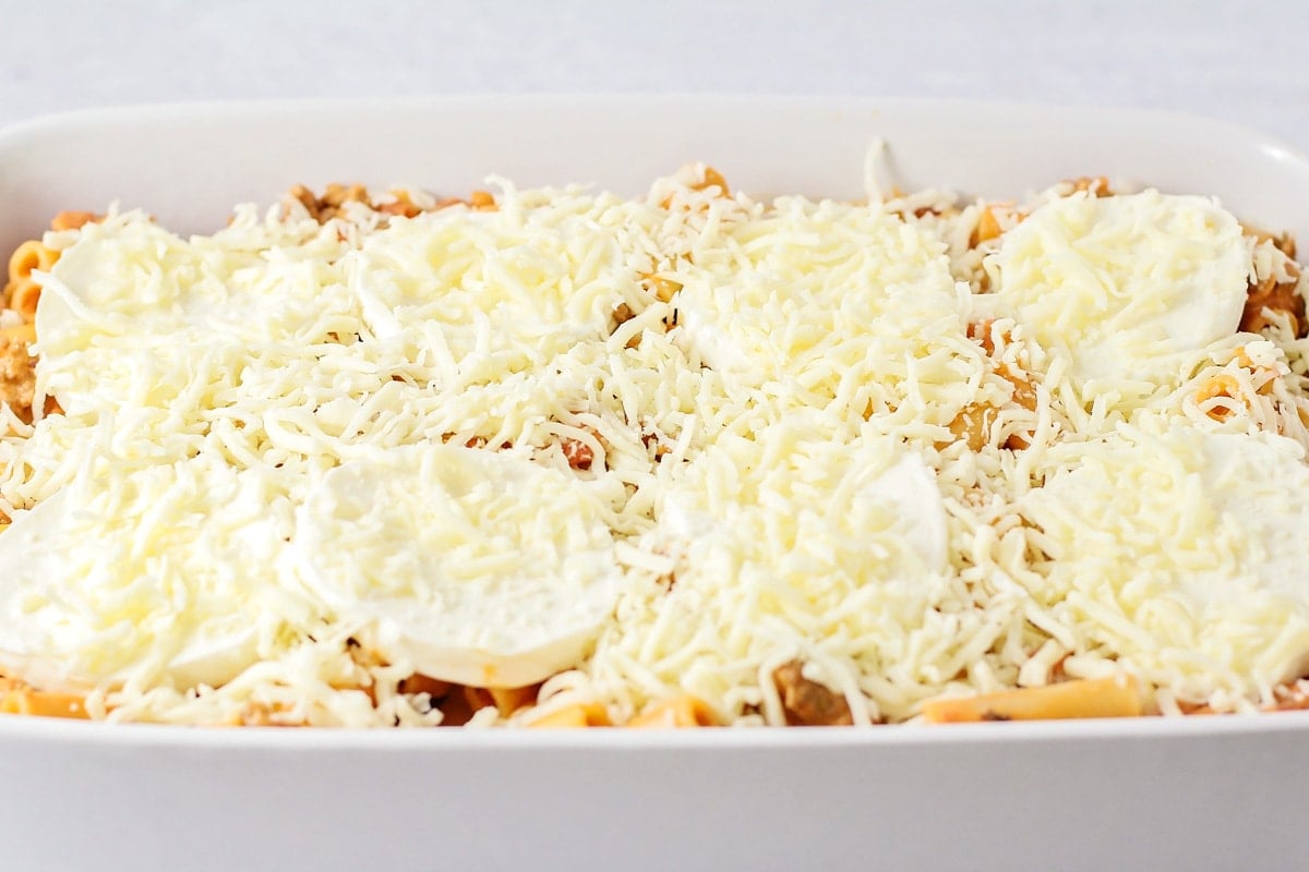 Topped easy baked ziti with cheese before baking.