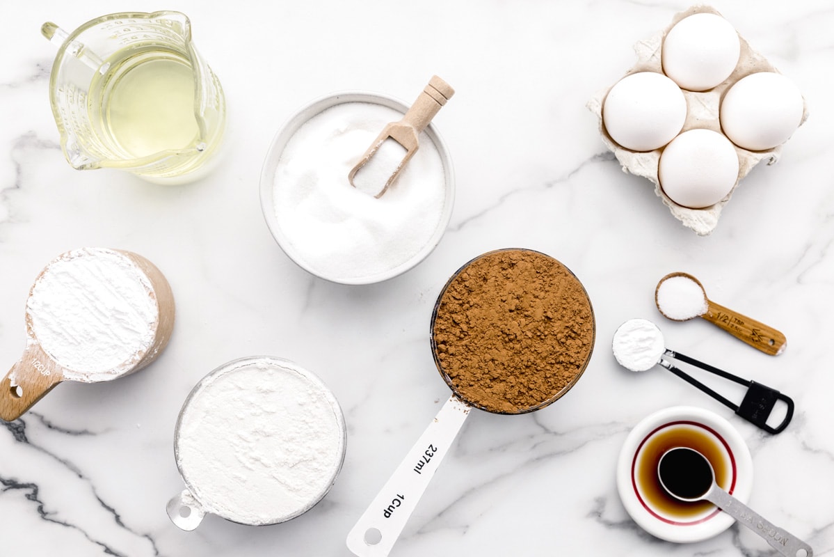 Ingredients for crinkle cookies on a white countertop.