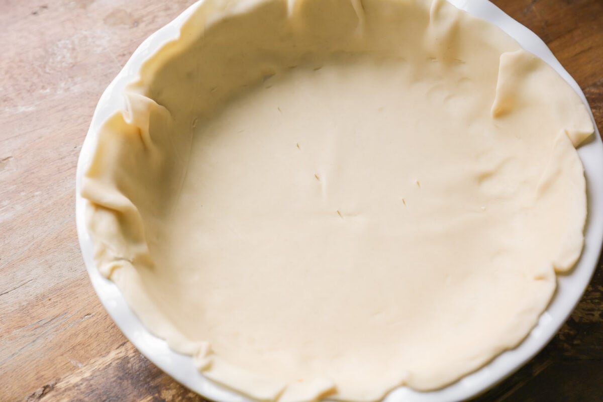 Pie crust in pan for chicken pot pie recipe.