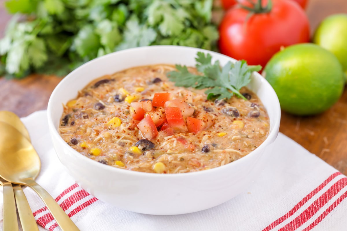 Crock pot taco soup recipe in white bowl.