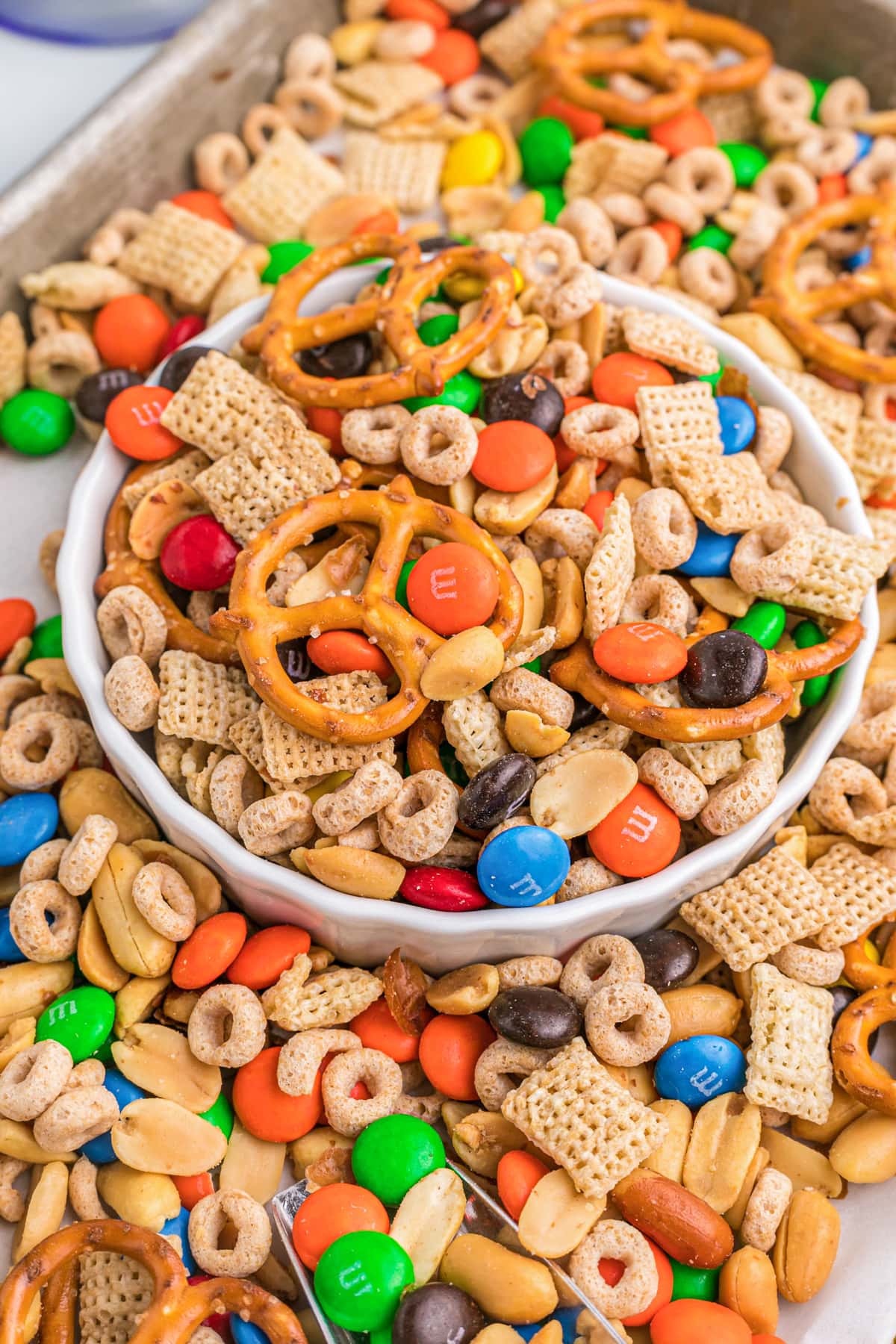 A close up of a bowl filled with sweet and salt chex mix.