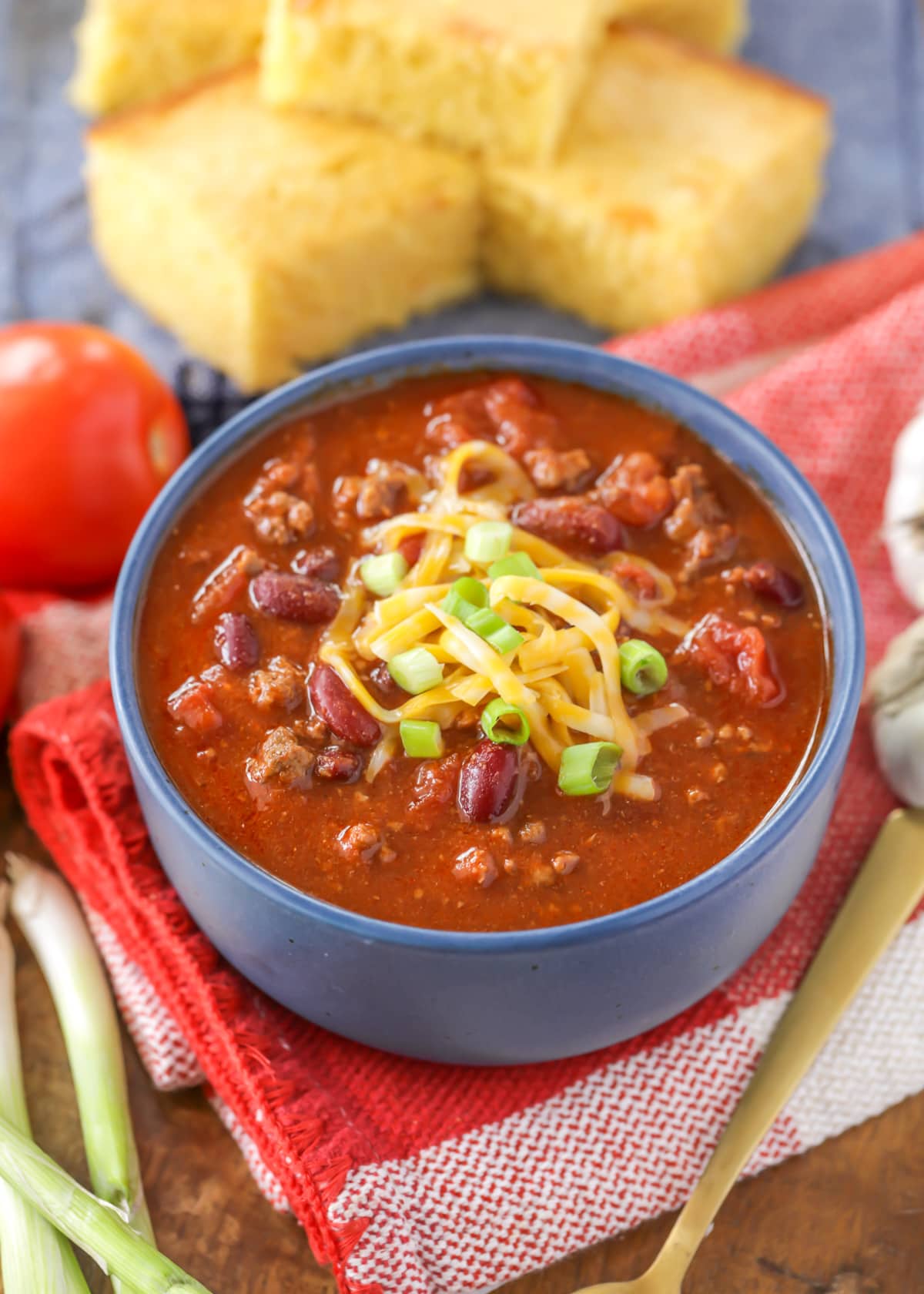 Our go-to chili recipe topped with shredded cheese and green onions.