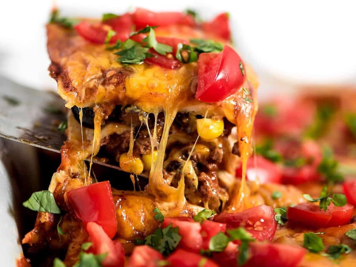 Enchilada casserole close up image.