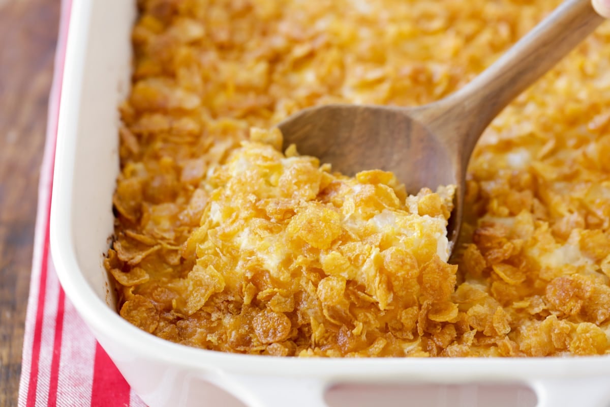 Close up of Funeral Potatoes in a baking dish.