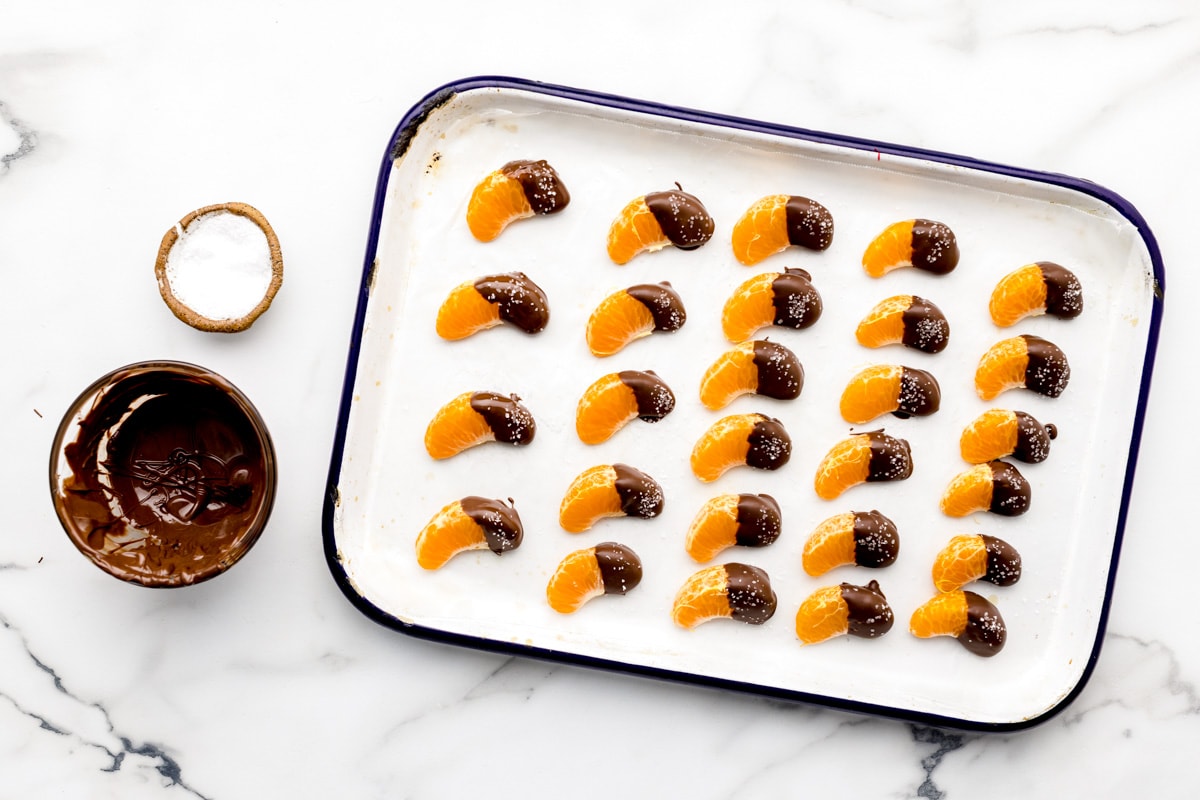 Salted chocolate mandarin orange slices for the halloween candy charcuterie board.
