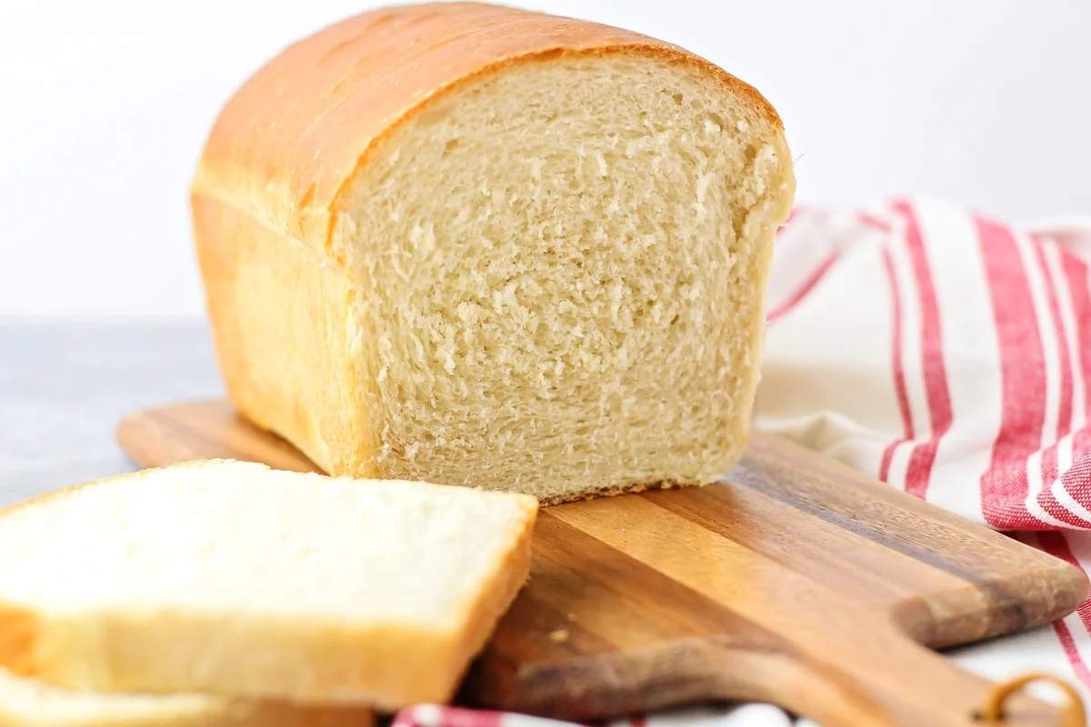 Bread recipe sliced up on a cutting board.