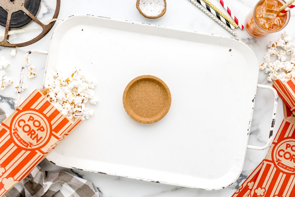 A mini graham cracker crust to use as a bowl on a movie night charcuterie board.