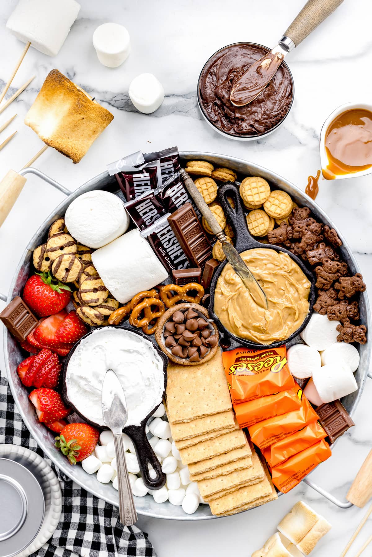 A close up of a S'mores Charcuterie Board piled with S'mores ingredients.