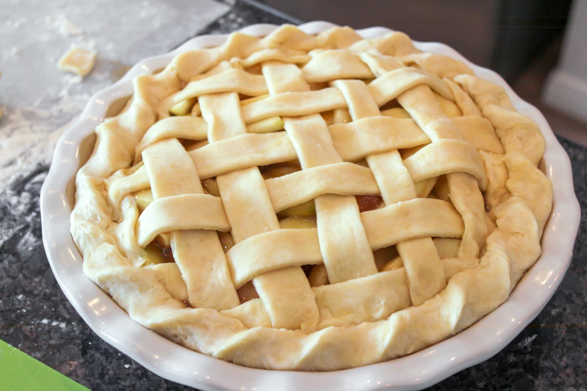 Lattice pie crust over homemade apple pie recipe.