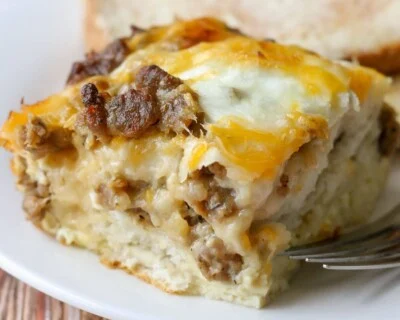 a serving of breakfast casserole with sausage and cheese visible