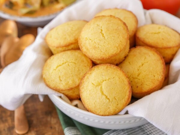 Basket full of cornbread muffins.