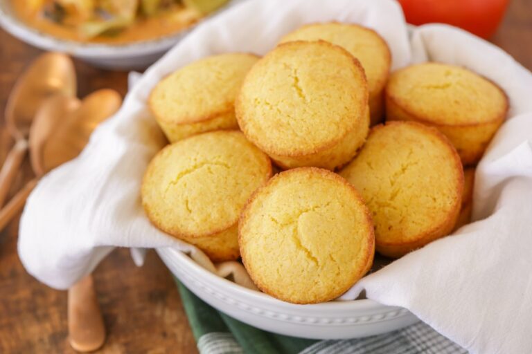 Basket full of cornbread muffins.