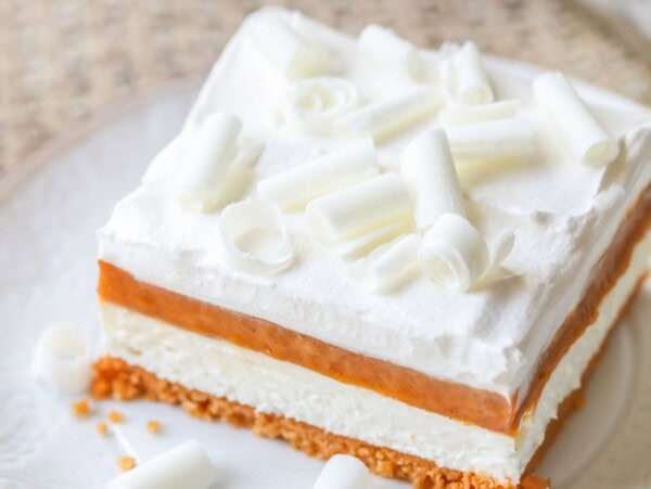 A square of pumpkin lasagna dessert.