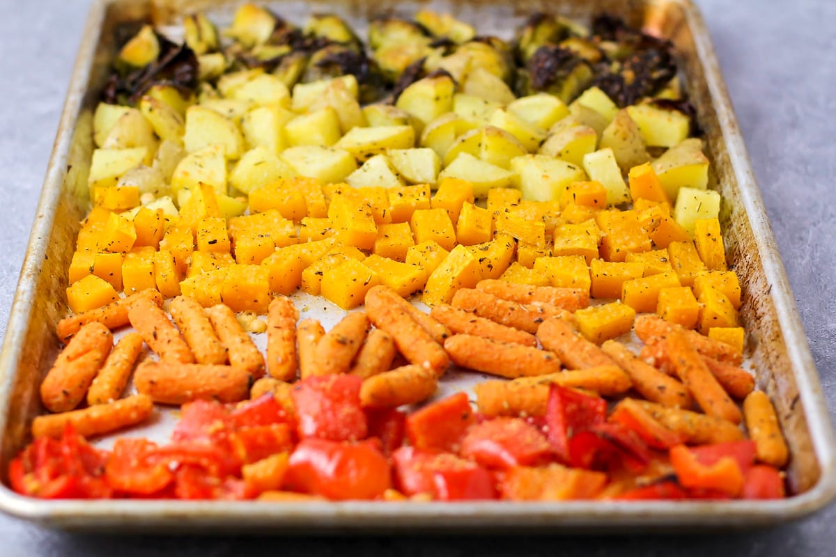 Roasted veggies baked on baking sheet.