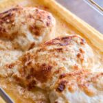 Creamy swiss chicken bake in a casserole dish.
