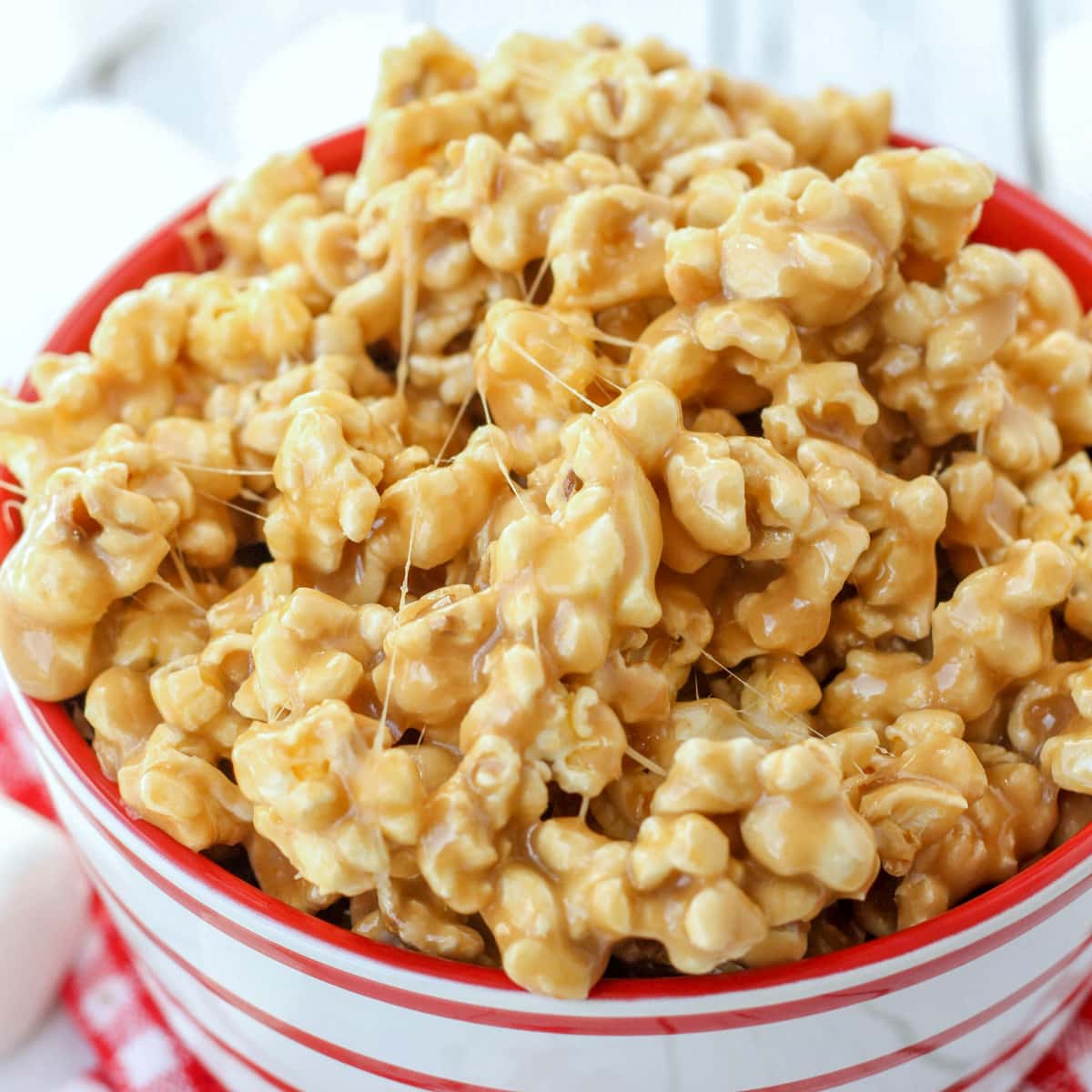 Deliciously gooey 5-minute Caramel Marshmallow Popcorn is simple, quick, and perfect for parties and holidays! 