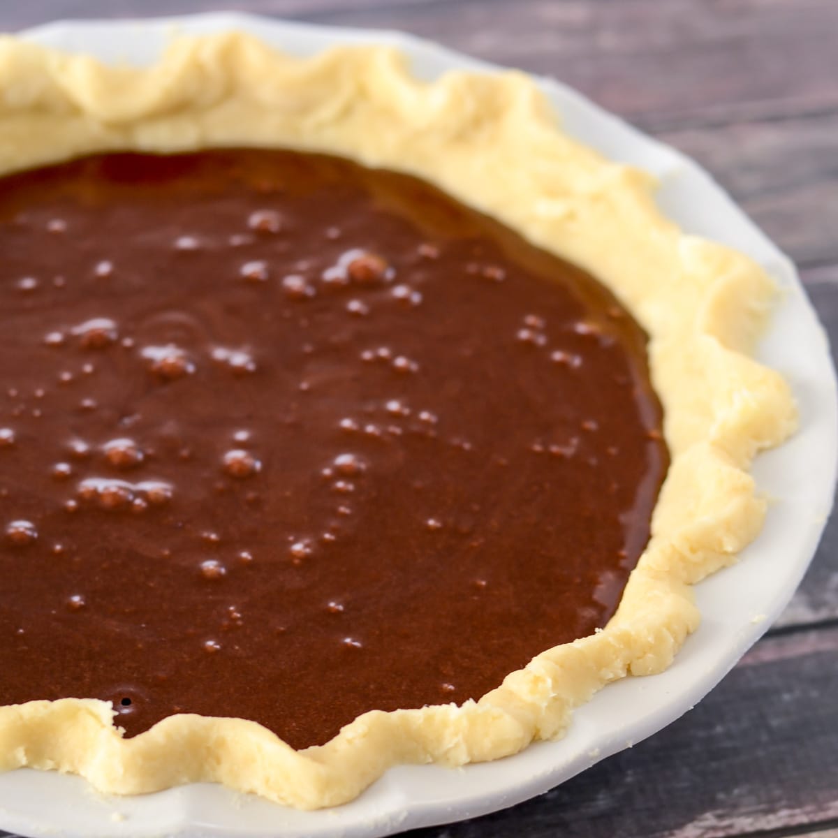 Chocolate filling in pie dish.