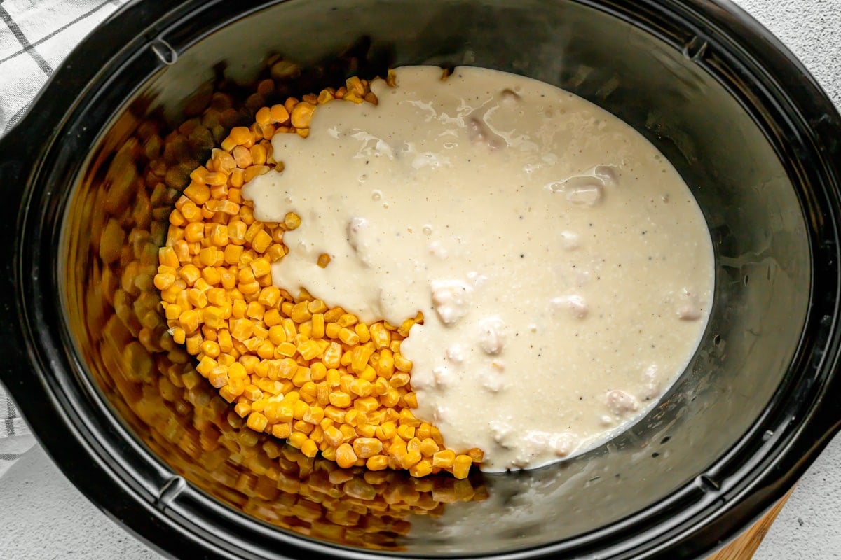 Slow cooker creamed corn ingredients in a crock pot.