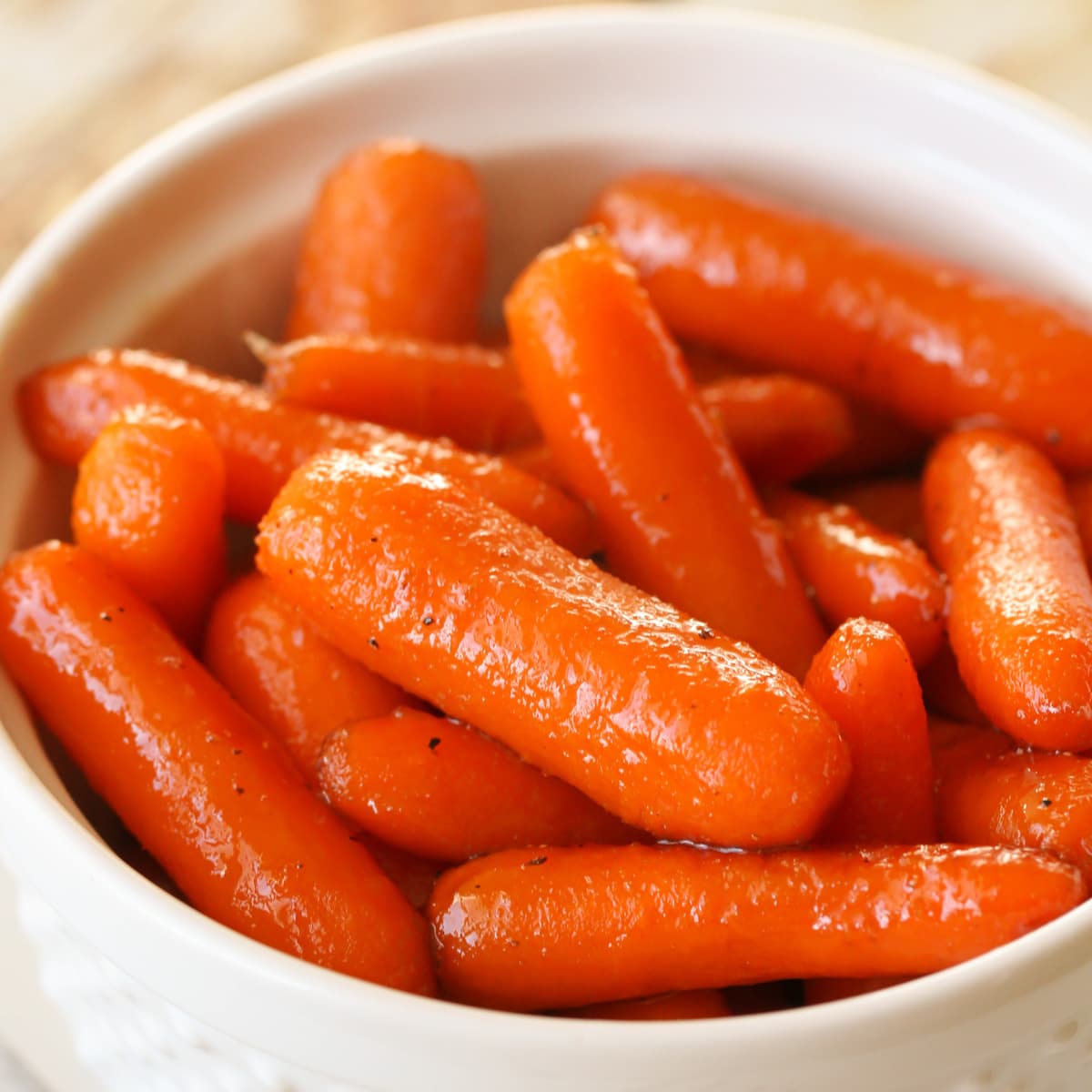 How to make glazed carrots with brown sugar, ingredients in a pan.