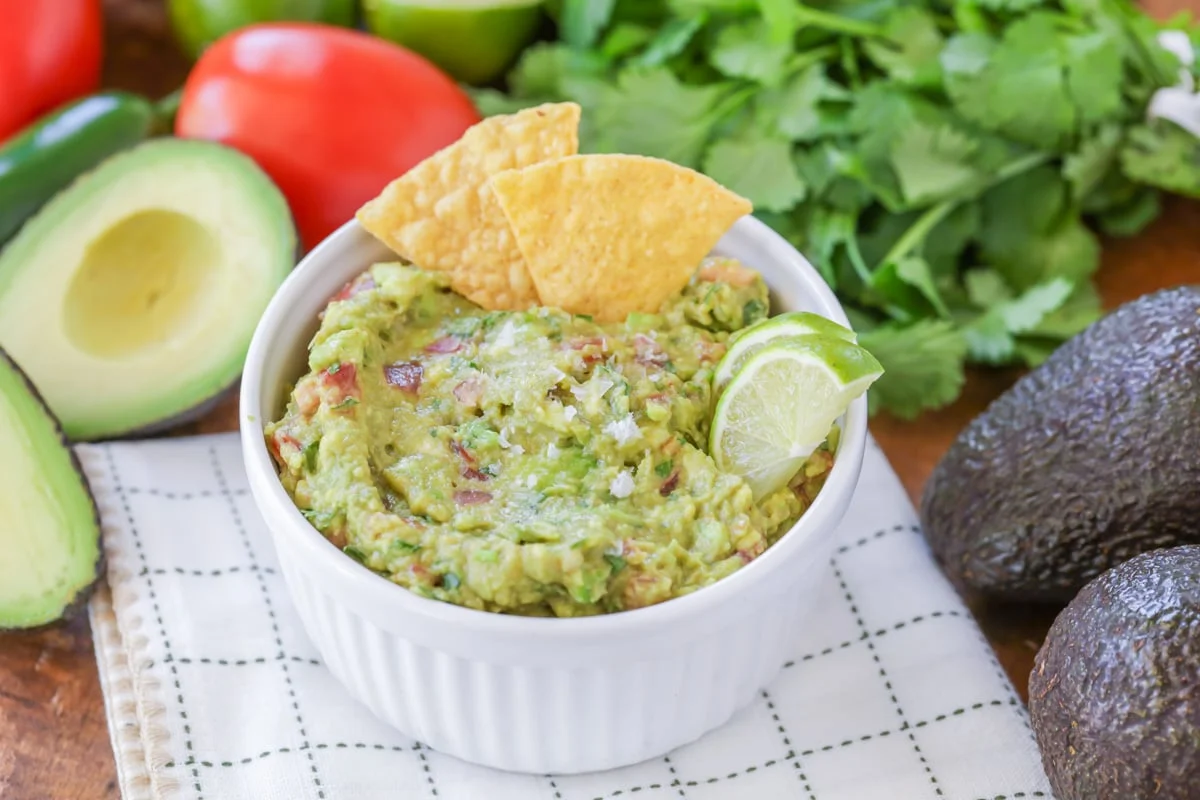 Guacamole served in a white bowl.