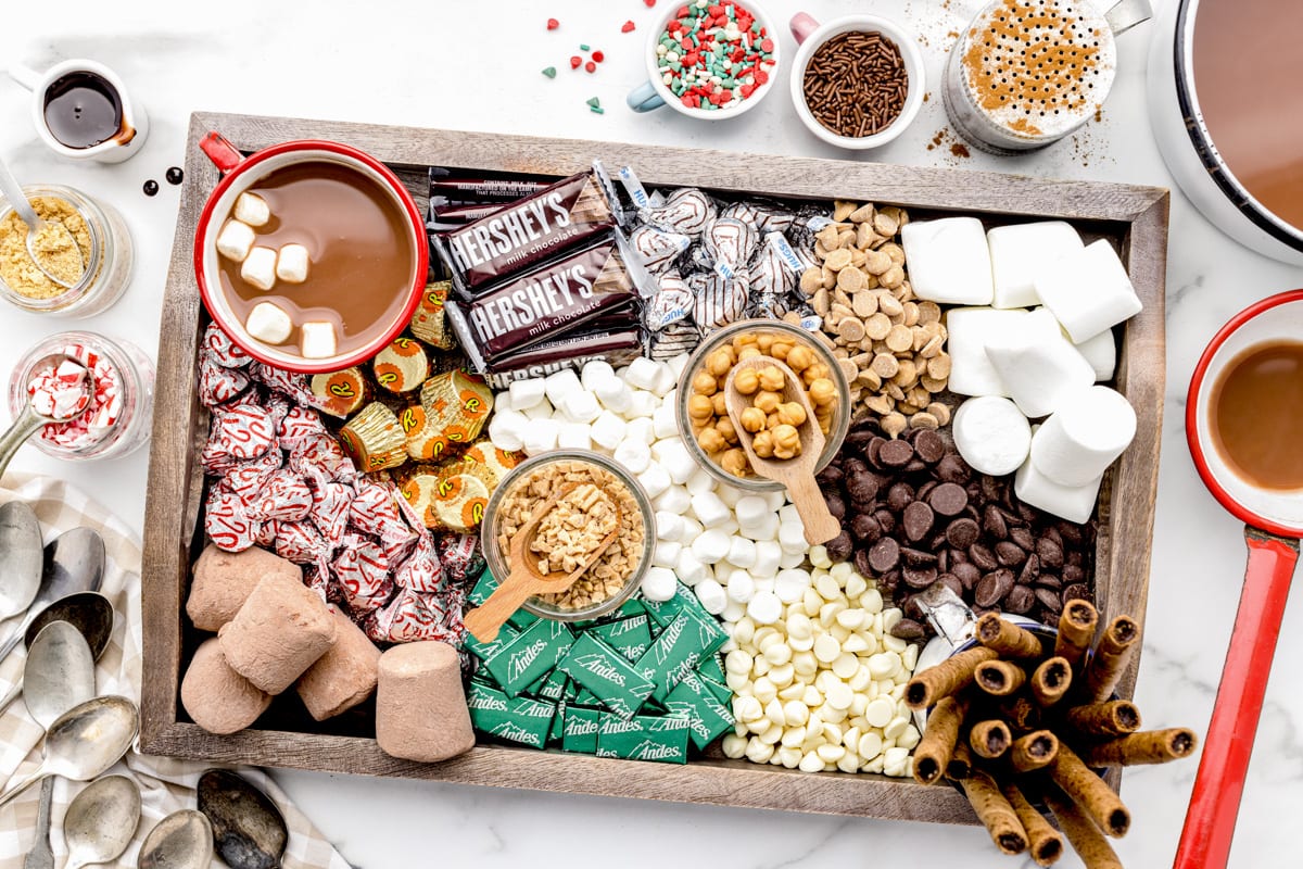 A hot chocolate charcuterie board filled with toppings.