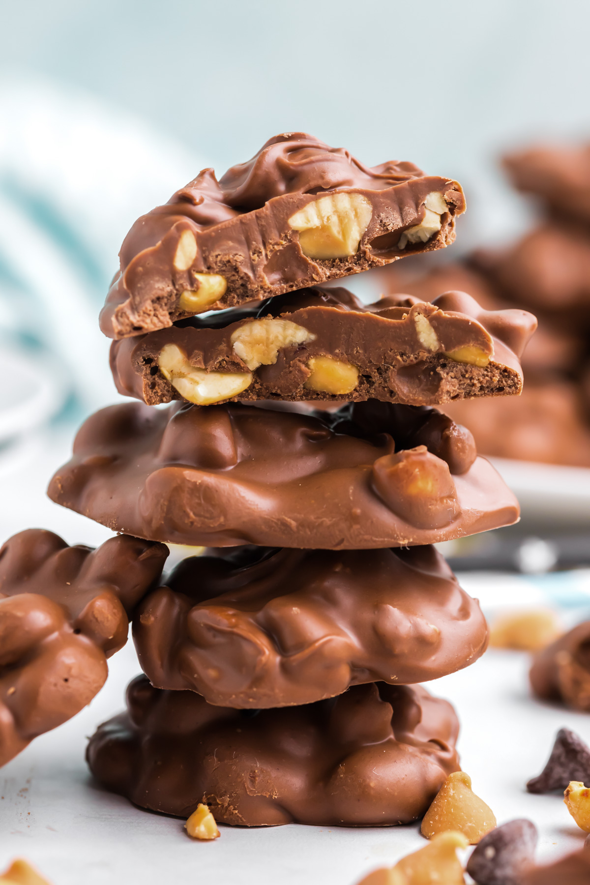 Peanut clusters stacked with one cut in half.