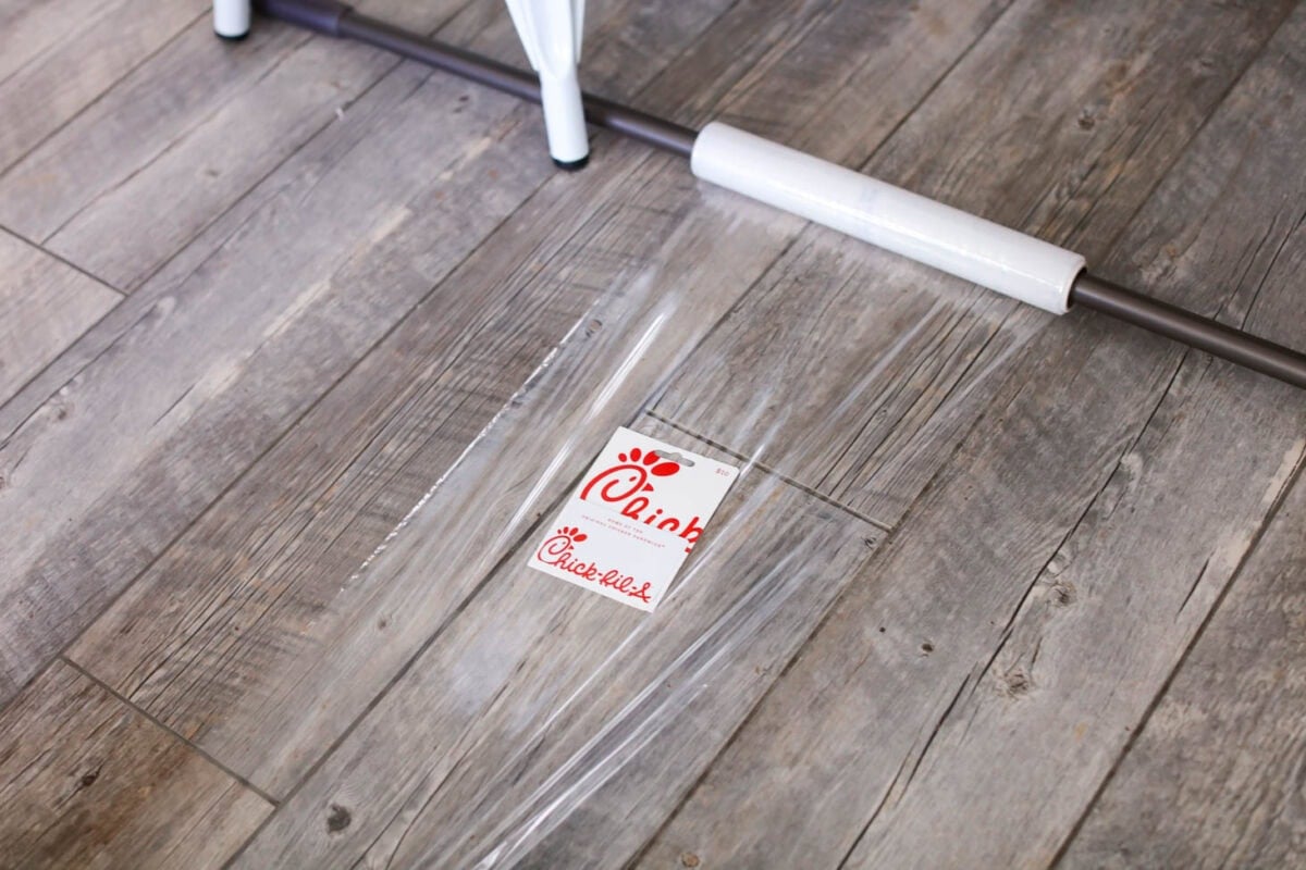 How to make the saran wrap ball game using a broom stick.
