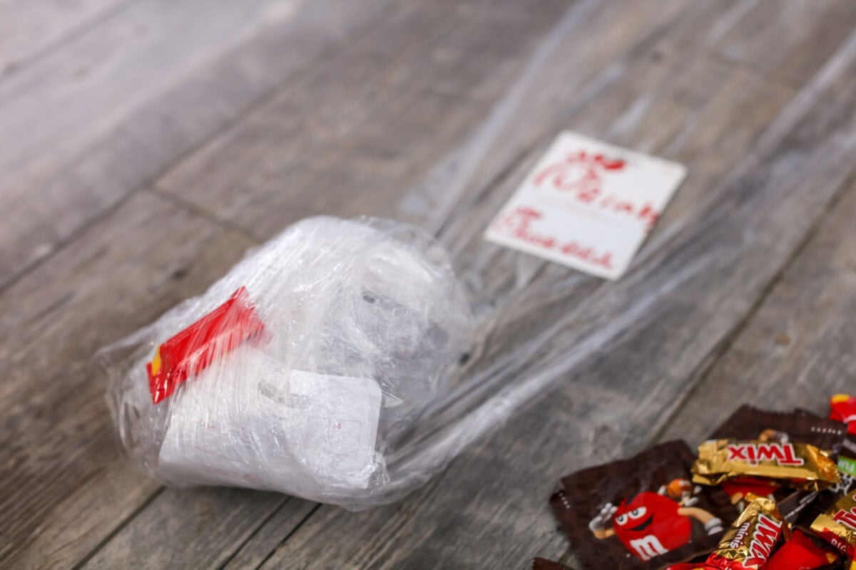 Wrapping up prizes in Saran Wrap.