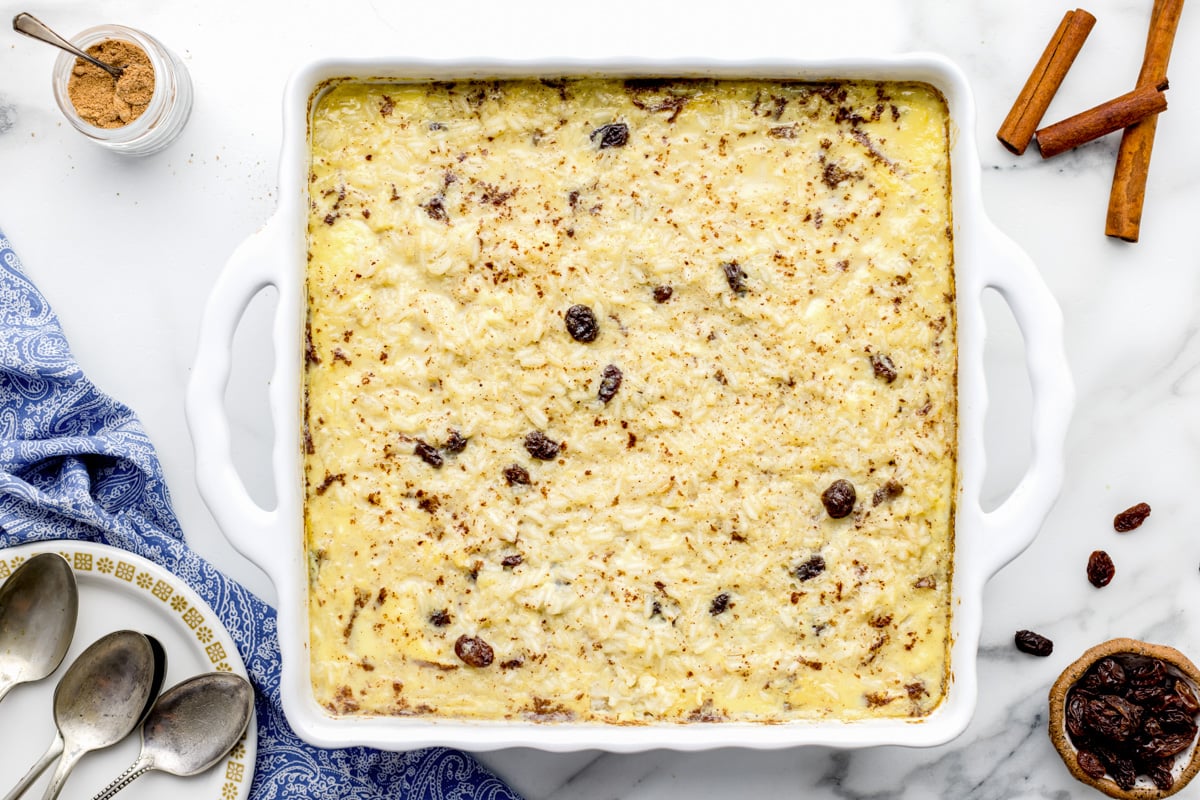 Baked rice pudding with raisins in a dish.