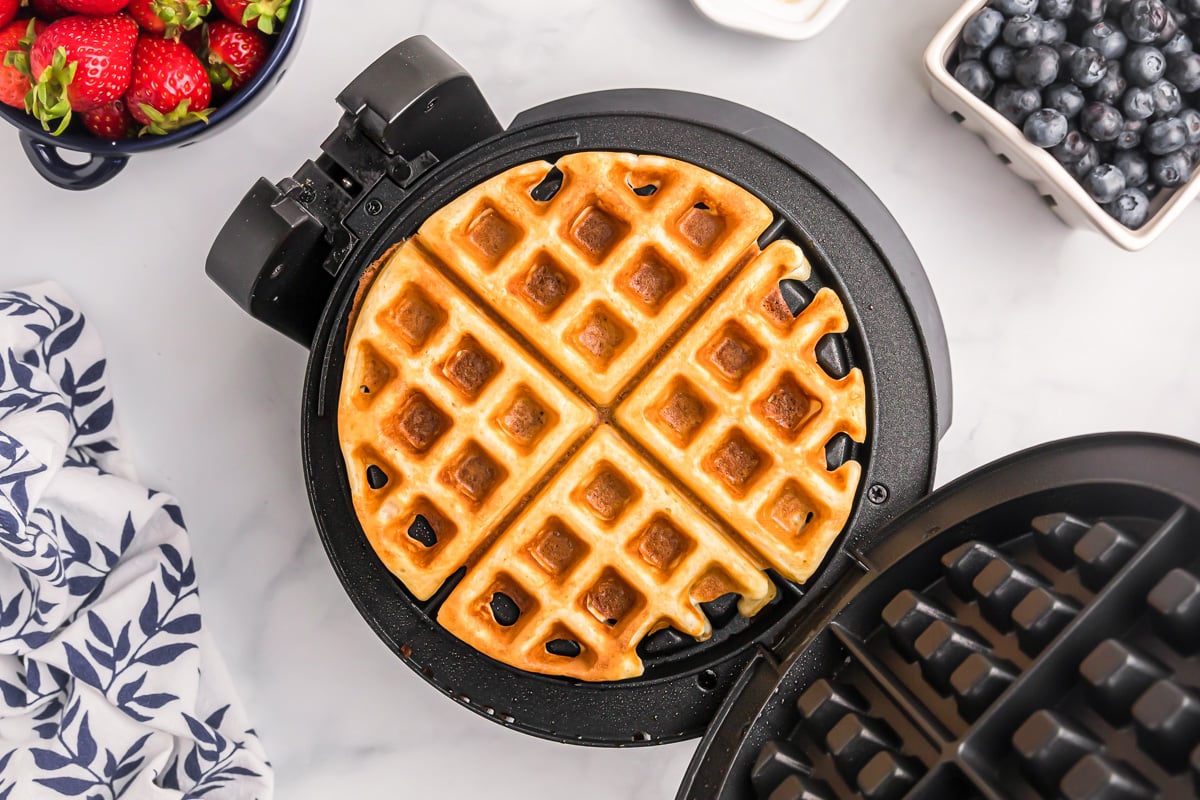 Cooked Bisquick Waffle recipe in a waffle iron.