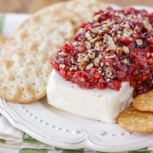 Cranberry cream cheese dip served with crackers.